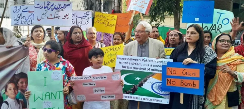 Participants at a peace demonstration in Lahore, 6 May, carry placards condemning the Pahalgam terrorist attack and the forces on either side leveraging it to justify war. Photo via Saeeda Diep.