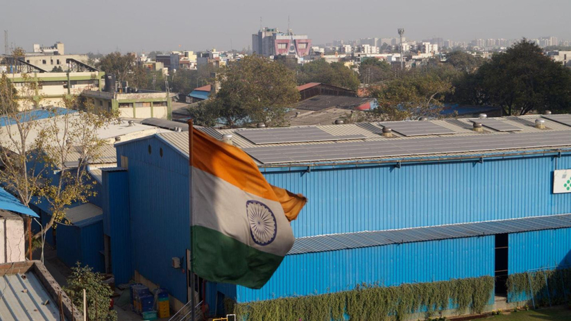 Rooftop solar installation on a warehouse in Delhi, India. Photo by Pallav Jain