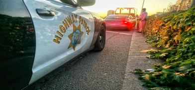 The Tesla car which was put by Param Sharma on selfdrive without a driver in the driver's seat as required by law is taken away after his arrest in California on May 11, 2021. (Photo: California Highway Patrol)