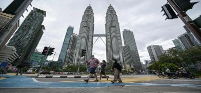 Malaysia withdraws travel restriction on workers Malaysia withdraws travel restriction on workers