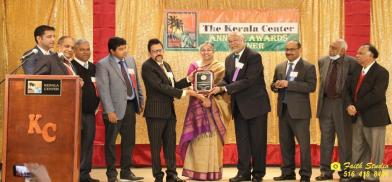 ACP President Dr. George Abraham receiving award from Indian Consul A.K. Vijayakrishnan. From l. to r. Kimmy John, Dr. Thomas Abraham, James Thottam, Dr. Madhu Bhaskaran, Consul Vijayakrishnan, Dr. Susan George, Dr. George Abraham, Alex Esthappan, Thambi Thalappillil and John Paul ACP President Dr. George Abraham receiving award from Indian Consul A.K. Vijayakrishnan. From l. to r. Kimmy John, Dr. Thomas Abraham, James Thottam, Dr. Madhu Bhaskaran, Consul Vijayakrishnan, Dr. Susan George, Dr. George Abraham, Alex Esthappan, Thambi Thalappillil and John Paul