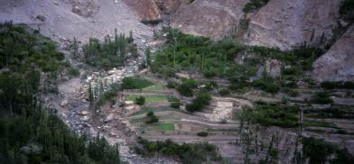 erraced fields in Hunza, Gilgit-Baltistan. Farmers say the early snowmelt this year has led to dry soil and a shortage of water for irrigation. (Image: Adrian Weston / Alamy)