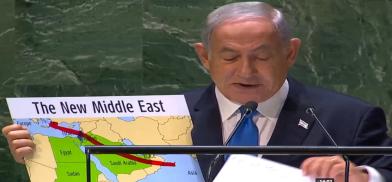Israel’s Prime Minister Benjamin Netanyahu holds up a map on which he dramatically marked the India-to-Europe Economic Corridor while speaking at the United Nations General Assembly on Friday, September 22, 2023. (Photo Source: UN) Israel’s Prime Minister Benjamin Netanyahu holds up a map on which he dramatically marked the India-to-Europe Economic Corridor while speaking at the United Nations General Assembly on Friday, September 22, 2023. (Photo Source: UN)