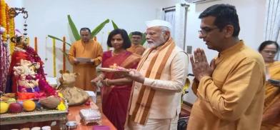 PM Modi at Chief Justice home for Ganesh puja (Photo: Twitter) PM Modi at Chief Justice home for Ganesh puja (Photo: Twitter)