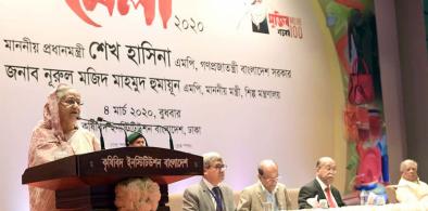 Prime Minister Sheikh Hasina addresses at the inauguration programme of ‘8th National SME Product Fair 2020’ at the Krishibid Institution Bangladesh (KIB) on Wednesday. Photo: PID