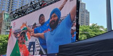 Fans at the India-Ireland T20 World Cup tournament match played in East Meadow, Long Island, on June 6, 2024, are shown live at the Occulus outside New York’s World Trade Center set up to introduce the game to visitors from around the world. (Photo: Arul Louis/IANS)