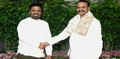 Union Minister of State for Parliamentary Affairs L Murugan, right, receives Sri Lankan President Anura Kumara Dissanayake upon his arrival in New Delhi