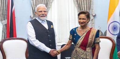 Prime Minister Modi with Trinidad Prime Minister Kamla Prasad Bissesar
