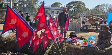 Vendors selling Nepal flags outside the Tribhuvan University cricket ground. Photo by Pragyan Srivastava