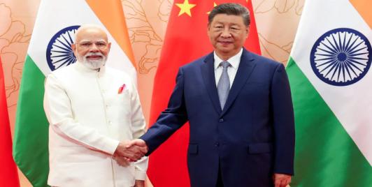 Xi and Modi handshake at Tianjin